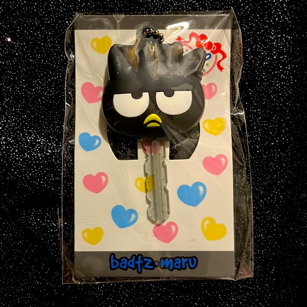 50th Anniversary Badtz-Maru Key Cap Keychain. Limited edition brand new.